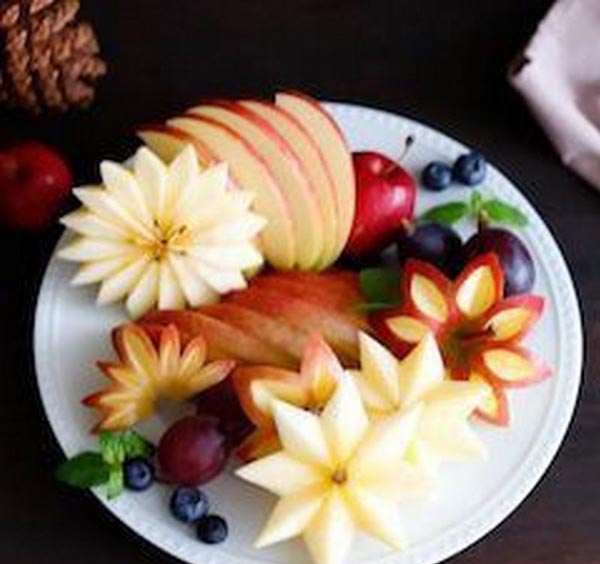 تزیین سیب شب یلدا با مدل های گل رز حکاکی و ایده های خلاقانه دیگر
